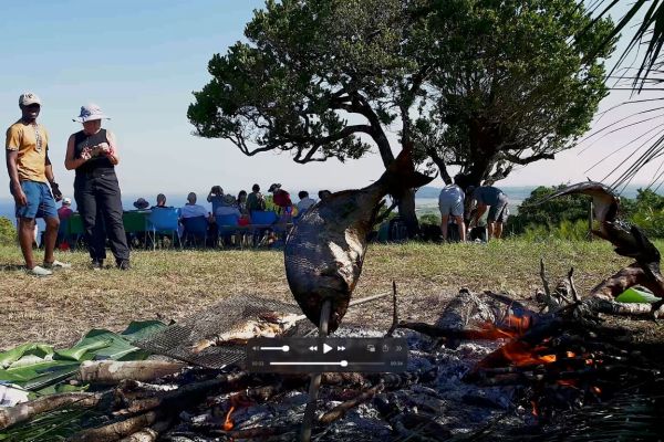 Fish cooking over an open fire during a Kosi Bay hiking excursion